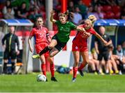 27 May 2023; Jessica Fitzgerald of Peamount United is tackled by Nadine Clare of Shelbourne as teammate Rachel Graham watches on during the SSE Airtricity Women's Premier Division match between Shelbourne and Peamount United at Tolka Park in Dublin. Photo by Tyler Miller/Sportsfile