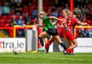 27 May 2023; Erin McLoughlin of Peamount United evades the tackle of Keeva Keenan of Shelbourne, 2, and Maggie Pierce during the SSE Airtricity Women's Premier Division match between Shelbourne and Peamount United at Tolka Park in Dublin. Photo by Tyler Miller/Sportsfile