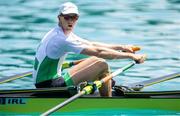 27 May 2023; Hugh Moore of Ireland compete in the Lightweight Men's Double Sculls Final A during day 3 of the European Rowing Championships 2023 at Bled in Slovenia. Photo by Vid Ponikvar/Sportsfile