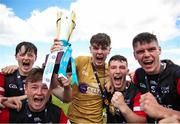 27 May 2023; East Cork players including captain Scott Molloy, centre, celebrate with the trophy after the GAA Celtic Challenge Cup Finals match between East Cork and Dublin at St Brendan’s Park in Birr, Offaly. Photo by Michael P Ryan/Sportsfile *** NO REPRODUCTION FEE***