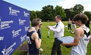 27 May 2023; Community Games president Gerry McGuinness presents medals to Monaghan u12 boys after the mixed distance relay after the Community Games Indoor Team and Cross Country Finals at Gormanston College in Gormanston, Meath. Photo by Eóin Noonan/Sportsfile