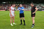 27 May 2023; Referee Martin McNally with team captains Brian Hurley of Cork, left, and Sam Mulroy of Louth before the GAA Football All-Ireland Senior Championship Round 1 match between Louth and Cork at Páirc Tailteann in Navan, Meath. Photo by Seb Daly/Sportsfile