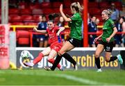 27 May 2023; Christie Gray of Shelbourne in action against Chloe Moloney of Peamount United, centre, and Erin McLoughlin during the SSE Airtricity Women's Premier Division match between Shelbourne and Peamount United at Tolka Park in Dublin. Photo by Tyler Miller/Sportsfile