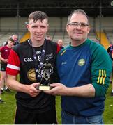 27 May 2023; Matthew Barrett of East Cork is presented with the best and fairest award after the GAA Celtic Challenge Cup Finals match between East Cork and Dublin at St Brendan’s Park in Birr, Offaly. Photo by Michael P Ryan/Sportsfile