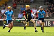 27 May 2023; Matthew Barrett of East Cork in action against Aaron Fahy, left, and Stephen Kane of Dublin during the GAA Celtic Challenge Cup Finals match between East Cork and Dublin at St Brendan’s Park in Birr, Offaly. Photo by Michael P Ryan/Sportsfile