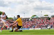 27 May 2023; Brian O'Driscoll of Cork shoots to score his side's first goal, past Louth goalkeeper James Califf, during the GAA Football All-Ireland Senior Championship Round 1 match between Louth and Cork at Páirc Tailteann in Navan, Meath. Photo by Seb Daly/Sportsfile