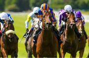 27 May 2023; Paddington, centre, with Ryan Moore up, on the way to winning Tattersalls Irish 2000 Guineas G1 during the Tattersalls Irish Guineas Festival at The Curragh Racecourse in Kildare. Photo by Matt Browne/Sportsfile