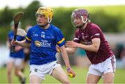27 May 2023; Cormac Fitzpatrick of Tipperary in action against Cathal Sweeney of Galway during the GAA Celtic Challenge Cup Finals match between Galway and Tipperary at St Brendan’s Park in Birr, Offaly. Photo by Michael P Ryan/Sportsfile