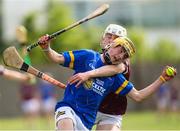 27 May 2023; Cormac Fitzpatrick of Tipperary in action against Luca Anjou of Galway during the GAA Celtic Challenge Cup Finals match between Galway and Tipperary at St Brendan’s Park in Birr, Offaly. Photo by Michael P Ryan/Sportsfile