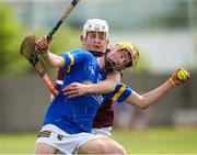 27 May 2023; Cormac Fitzpatrick of Tipperary in action against Luca Anjou of Galway during the GAA Celtic Challenge Cup Finals match between Galway and Tipperary at St Brendan’s Park in Birr, Offaly. Photo by Michael P Ryan/Sportsfile