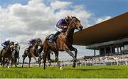 27 May 2023; Paddington, with Ryan Moore up, on their way to winning the Tattersalls Irish 2,000 Guineas during the Tattersalls Irish Guineas Festival at The Curragh Racecourse in Kildare. Photo by Matt Browne/Sportsfile