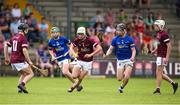 27 May 2023; Ian Ward of Galway in action against Sam Dooley, left, and Billy Collins of Tipperary during the GAA Celtic Challenge Cup Finals match between Galway and Tipperary at St Brendan’s Park in Birr, Offaly. Photo by Michael P Ryan/Sportsfile *** NO REPRODUCTION FEE***