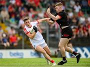 27 May 2023; Luke Fahy of Cork in action against Peter Lynch of Louth during the GAA Football All-Ireland Senior Championship Round 1 match between Louth and Cork at Páirc Tailteann in Navan, Meath. Photo by Seb Daly/Sportsfile