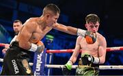 27 May 2023; Connor Quinn in action against Juan Hinostroza during their super-flyweight bout at the SSE Arena in Belfast. Photo by Ramsey Cardy/Sportsfile