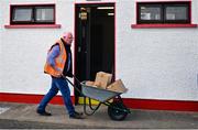 27 May 2023; Steward Marcus McCrystal wheelbarrows match programmes before the GAA Football All-Ireland Senior Championship Round 1 match between Derry and Monaghan at Celtic Park in Derry. Photo by Harry Murphy/Sportsfile