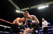 27 May 2023; Kurt Walker, right, in action against Maicol Velazco during their featherweight bout at the SSE Arena in Belfast. Photo by Ramsey Cardy/Sportsfile