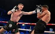 27 May 2023; Kurt Walker, left, in action against Maicol Velazco during their featherweight bout at the SSE Arena in Belfast. Photo by Ramsey Cardy/Sportsfile