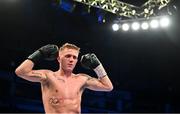 27 May 2023; Kurt Walker celebrates defeating Maicol Velazco in their featherweight bout at the SSE Arena in Belfast. Photo by Ramsey Cardy/Sportsfile