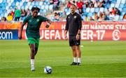 27 May 2023; Ikechukwu Orazi of Republic of Ireland and coach David Meyler before the UEFA European U17 Championship Quarter-Final match between Spain and Republic of Ireland at Hidegkuti Hándor Stadium in Budapest, Hungary. Photo by Laszlo Szirtesi/Sportsfile