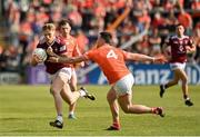 27 May 2023; Luke Loughlin of Westmeath in action against Aidan Forker of Armagh during the GAA Football All-Ireland Senior Championship Round 1 match between Armagh and Westmeath at the BOX-IT Athletic Grounds in Armagh. Photo by Oliver McVeigh/Sportsfile