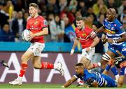 27 May 2023; Jack Crowley of Munster breaks away from Leolin Zas of DHL Stormers during the United Rugby Championship Final match between DHL Stormers and Munster at DHL Stadium in Cape Town, South Africa. Photo by Nic Bothma/Sportsfile
