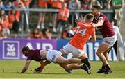 27 May 2023; Rian O'Neill of Armagh in action against Kevin Maguire and Ray Connellan of Westmeath during the GAA Football All-Ireland Senior Championship Round 1 match between Armagh and Westmeath at the BOX-IT Athletic Grounds in Armagh. Photo by Oliver McVeigh/Sportsfile