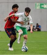 27 May 2023; Cory O'Sullivan of Republic of Ireland in action against Lamine Yamal Nasraoui Ebana of Spain during the UEFA European U17 Championship Quarter-Final match between Spain and Republic of Ireland at Hidegkuti Hándor Stadium in Budapest, Hungary. Photo by Laszlo Szirtesi/Sportsfile