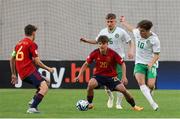 27 May 2023; Juan Hernández Torres of Spain in action against Daniel McGrath and Najemedine Razi of Republic of Ireland during the UEFA European U17 Championship Quarter-Final match between Spain and Republic of Ireland at Hidegkuti Hándor Stadium in Budapest, Hungary. Photo by Laszlo Szirtesi/Sportsfile