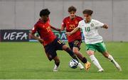 27 May 2023; Najemedine Razi of Republic of Ireland in action against Lamine Yamal Nasraoui Ebana and Juan Hernández Torres of Spain during the UEFA European U17 Championship Quarter-Final match between Spain and Republic of Ireland at Hidegkuti Hándor Stadium in Budapest, Hungary. Photo by Laszlo Szirtesi/Sportsfile