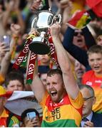 27 May 2023; Carlow captain Paul Doyle lifts the trophy after the Joe McDonagh Cup Final match between Carlow and Offaly at Croke Park in Dublin. Photo by Stephen Marken/Sportsfile