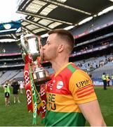 27 May 2023; Jack Kavanagh of Carlow celebrates with the trophy after the Joe McDonagh Cup Final match between Carlow and Offaly at Croke Park in Dublin. Photo by Stephen Marken/Sportsfile