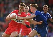 27 May 2023; Shane McGuigan of Derry in action against Karl Gallagher of Monaghan during the GAA Football All-Ireland Senior Championship Round 1 match between Derry and Monaghan at Celtic Park in Derry. Photo by Harry Murphy/Sportsfile