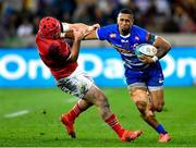 27 May 2023; Leolin Zas of DHL Stormers is tackled by John Hodnett of Munster  during the United Rugby Championship Final match between DHL Stormers and Munster at DHL Stadium in Cape Town, South Africa. Photo by Ashley Vlotman/Sportsfile