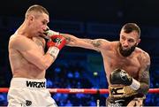 27 May 2023; Anthony Cacace, right, in action against Damian Wrzesinski during their IBO World Super-Featherweight title bout at the SSE Arena in Belfast. Photo by Ramsey Cardy/Sportsfile