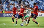 27 May 2023; Najemedine Razi of Republic of Ireland in action against Pau Prim Coma and Izan Merino Rodíguez of Spain during the UEFA European U17 Championship Quarter-Final match between Spain and Republic of Ireland at Hidegkuti Hándor Stadium in Budapest, Hungary. Photo by Laszlo Szirtesi/Sportsfile