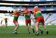 27 May 2023; Carlow players, from left, Martin Kavanagh, Paddy Boland, Jack Tracey, and Chris Nolan celebrate after the final whistle during the Joe McDonagh Cup Final match between Carlow and Offaly at Croke Park in Dublin. Photo by Tyler Miller/Sportsfile