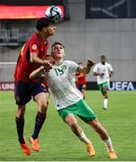 27 May 2023; Mason Melia of Republic of Ireland in action against Jon Martín Vicente of Spain during the UEFA European U17 Championship Quarter-Final match between Spain and Republic of Ireland at Hidegkuti Hándor Stadium in Budapest, Hungary. Photo by Laszlo Szirtesi/Sportsfile