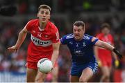 27 May 2023; Shane McGuigan of Derry in action against Ryan Wylie of Monaghan during the GAA Football All-Ireland Senior Championship Round 1 match between Derry and Monaghan at Celtic Park in Derry. Photo by Harry Murphy/Sportsfile