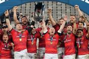 27 May 2023; Munster captain Peter O'Mahony, left, and Keith Earls lift the trophy as teammates celebrate after winning the United Rugby Championship Final match between DHL Stormers and Munster at DHL Stadium in Cape Town, South Africa. Photo by Nic Bothma/Sportsfile