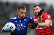 27 May 2023; Ryan Mc Anespie of Monaghan in action against Niall Loughlin of Derry during the GAA Football All-Ireland Senior Championship Round 1 match between Derry and Monaghan at Celtic Park in Derry. Photo by Harry Murphy/Sportsfile