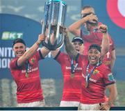 27 May 2023; Munster players, from left, Jack Crowley, Alen Kendellen and Malakai Fekitoa celebrate with the trophy after the United Rugby Championship Final match between DHL Stormers and Munster at DHL Stadium in Cape Town, South Africa. Photo by Grant Pitcher/Sportsfile