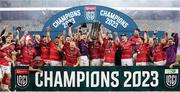 27 May 2023; Munster players celebrate with the trophy after victory in the United Rugby Championship Final match between DHL Stormers and Munster at DHL Stadium in Cape Town, South Africa. Photo by Nic Bothma/Sportsfile