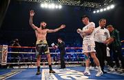 27 May 2023; Anthony Cacace is declared victorious over Damian Wrzesinski in their IBO World Super-Featherweight title bout at the SSE Arena in Belfast. Photo by Ramsey Cardy/Sportsfile
