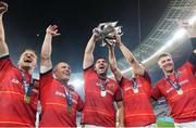 27 May 2023; Munster players, from left, Mike Haley, Keith Earls, Tadhg Beirne, Conor Murray and captain Peter O'Mahony celebrate with the trophy after winning the United Rugby Championship Final match between DHL Stormers and Munster at DHL Stadium in Cape Town, South Africa. Photo by Nic Bothma/Sportsfile