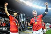 27 May 2023; Munster players Conor Murray, left, and captain Peter O'Mahony celebrate with the trophy after the United Rugby Championship Final match between DHL Stormers and Munster at DHL Stadium in Cape Town, South Africa. Photo by Ashley Vlotman/Sportsfile