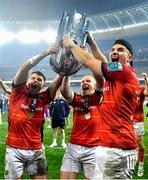 27 May 2023; Munster players, from left, Calvin Nash, Keith Earls and Shane Daly celebrate with the trophy after the United Rugby Championship Final match between DHL Stormers and Munster at DHL Stadium in Cape Town, South Africa. Photo by Ashley Vlotman/Sportsfile