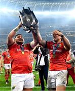 27 May 2023; Munster players Roman Salanoa, left, and Malakai Fekitoa celebrate with the trophy after the United Rugby Championship Final match between DHL Stormers and Munster at DHL Stadium in Cape Town, South Africa. Photo by Ashley Vlotman/Sportsfile
