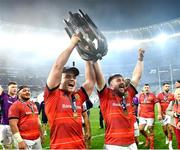 27 May 2023; Munster players Alex Kendellen, left, and John Hodnett celebrate with the trophy after the United Rugby Championship Final match between DHL Stormers and Munster at DHL Stadium in Cape Town, South Africa. Photo by Ashley Vlotman/Sportsfile