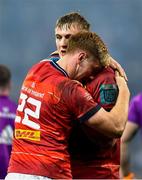 27 May 2023; Munstr players Gavin Coombes, left, and Ben Healy celebrate at the final whistle of the United Rugby Championship Final match between DHL Stormers and Munster at DHL Stadium in Cape Town, South Africa. Photo by Ashley Vlotman/Sportsfile