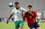 27 May 2023; Nickson Okosun of Republic of Ireland in action against Pau Cubarsí Peredes of Spain during the UEFA European U17 Championship Quarter-Final match between Spain and Republic of Ireland at Hidegkuti Hándor Stadium in Budapest, Hungary. Photo by Laszlo Szirtesi/Sportsfile